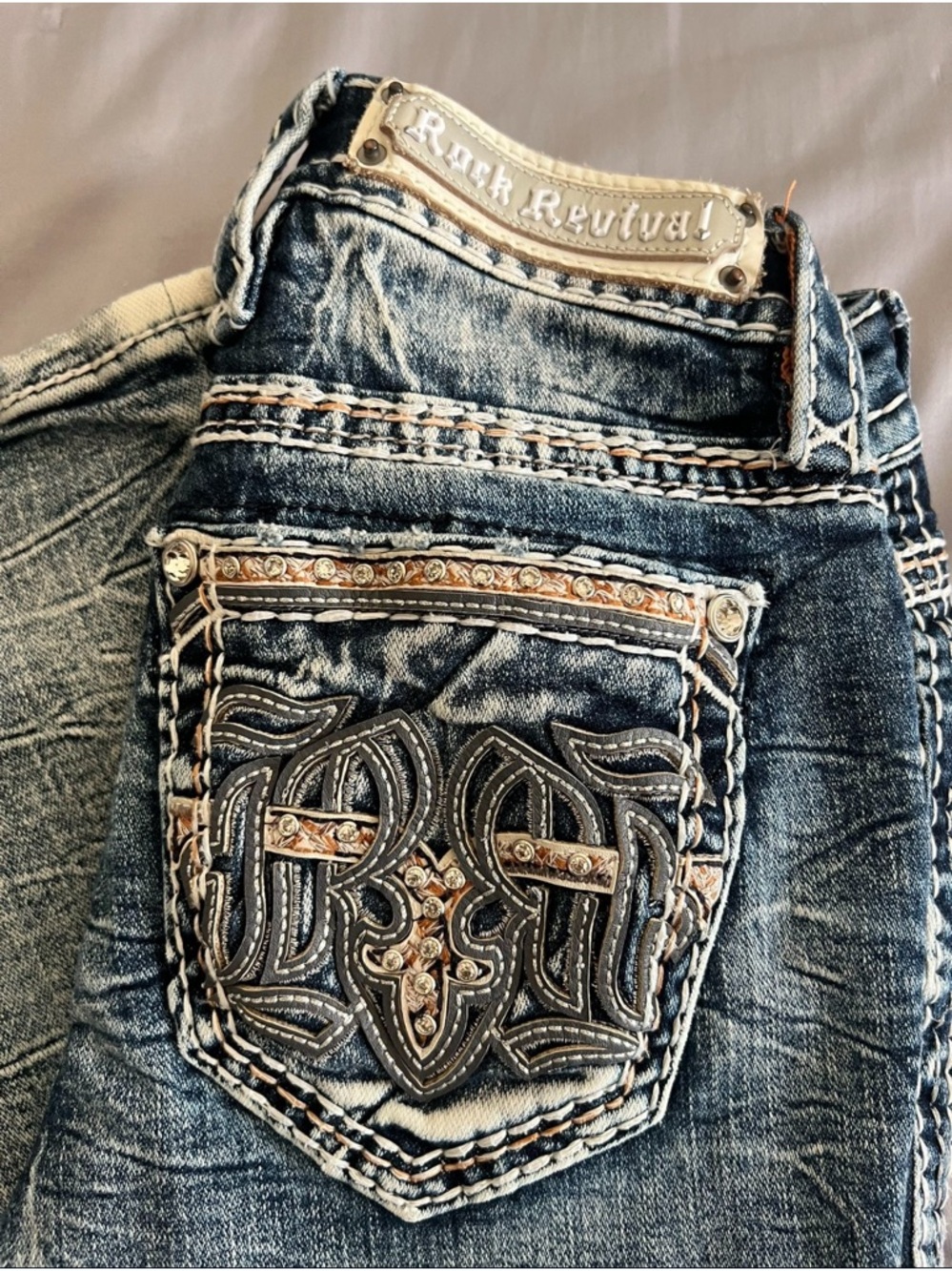 Rock Revival Distressed Blue Denim Jeans with Embellished Pocket